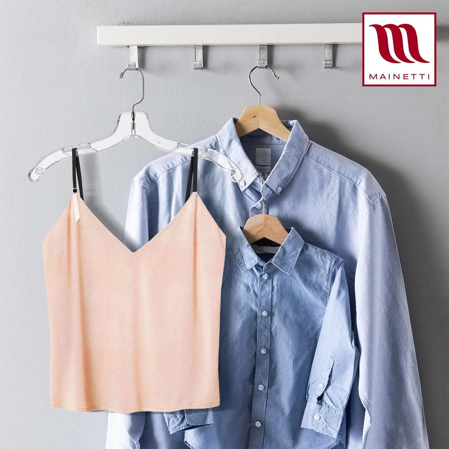 Mainetti 5400SCR Clear Plastic Hangers - 50 Pack with 360 Swivel Metal Hook and Notches for Straps, Great for Shirts/Tops/Dresses, 17-inch Mainetti 5400SCR Clear Plastic Hangers - 50 Pack with 360 Swivel Metal Hook and Notches for Straps, Great for Shirts/Tops/Dresses, 17-inch