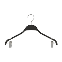 Black hanger with clips on a white background